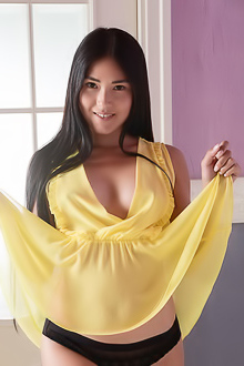 Kimiko Feeling Flirty In Her Sheer Yellow Top