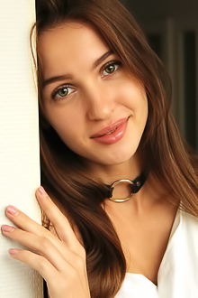 Holly Haim Wearing Nothing But A Leather Choker And A Playful Smile